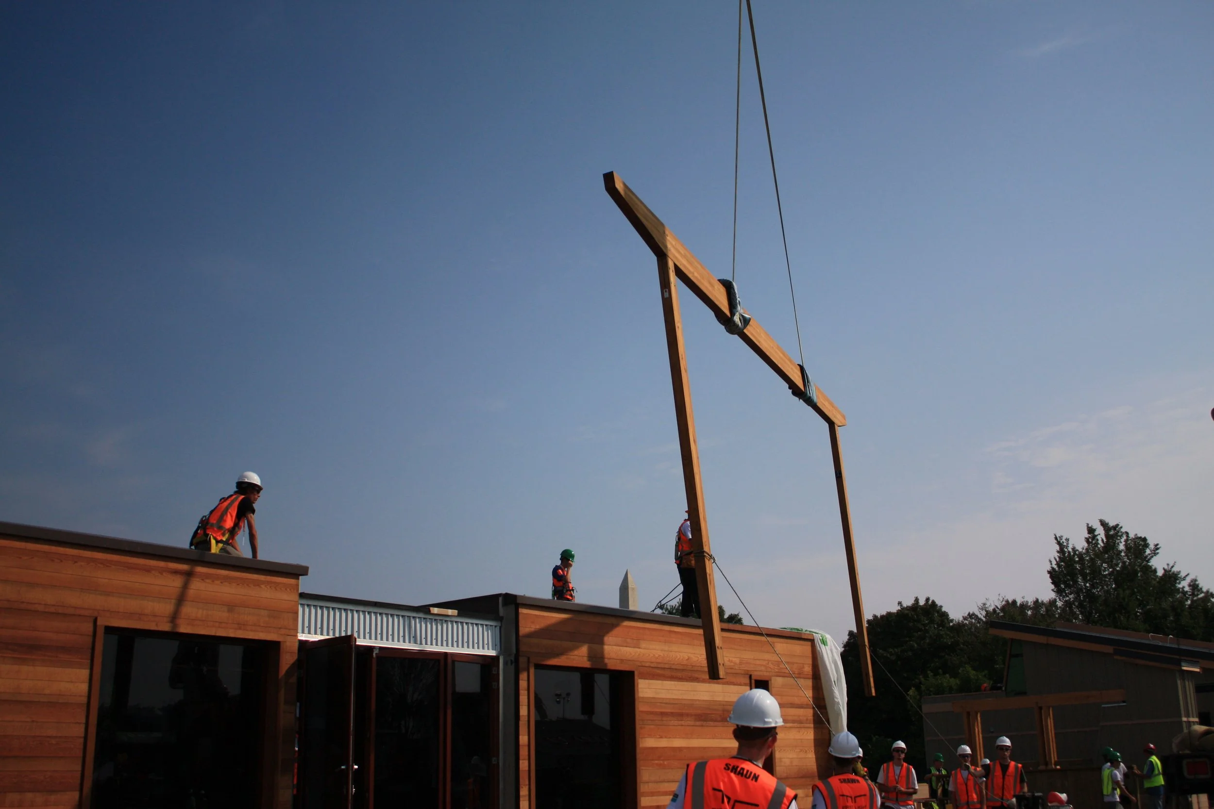 The First Light House Eco House Timber structure is assembled on the Wellington Waterfront
