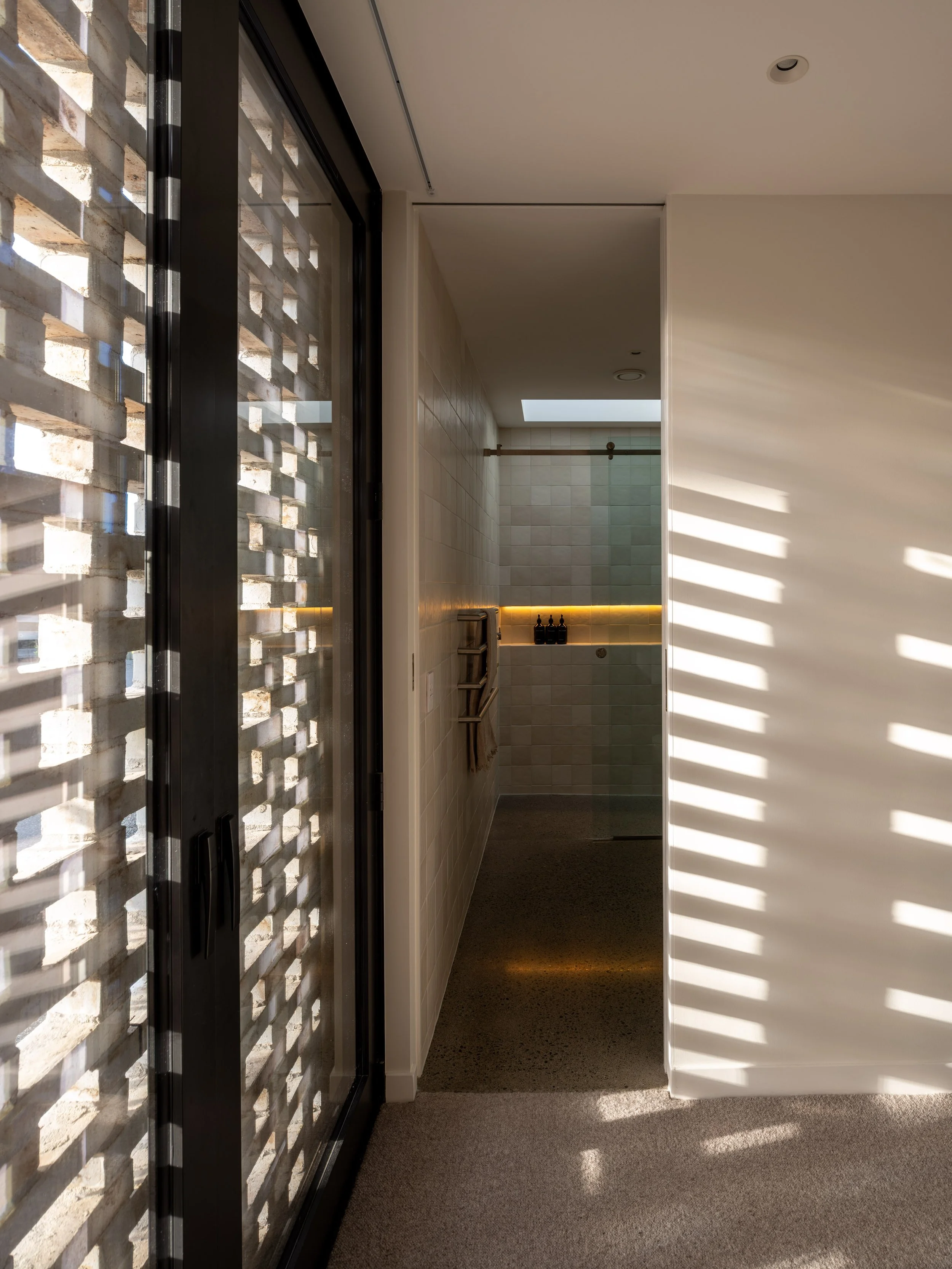 Brick screening detail creating privacy and filtered light