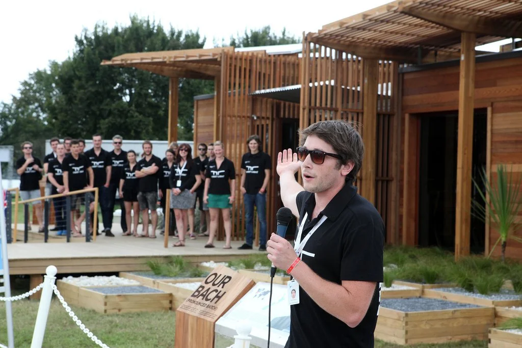 Nick Officer, director of First Light Studio explains the First Light House to the judges at the Solar Decathlon in Washington DC