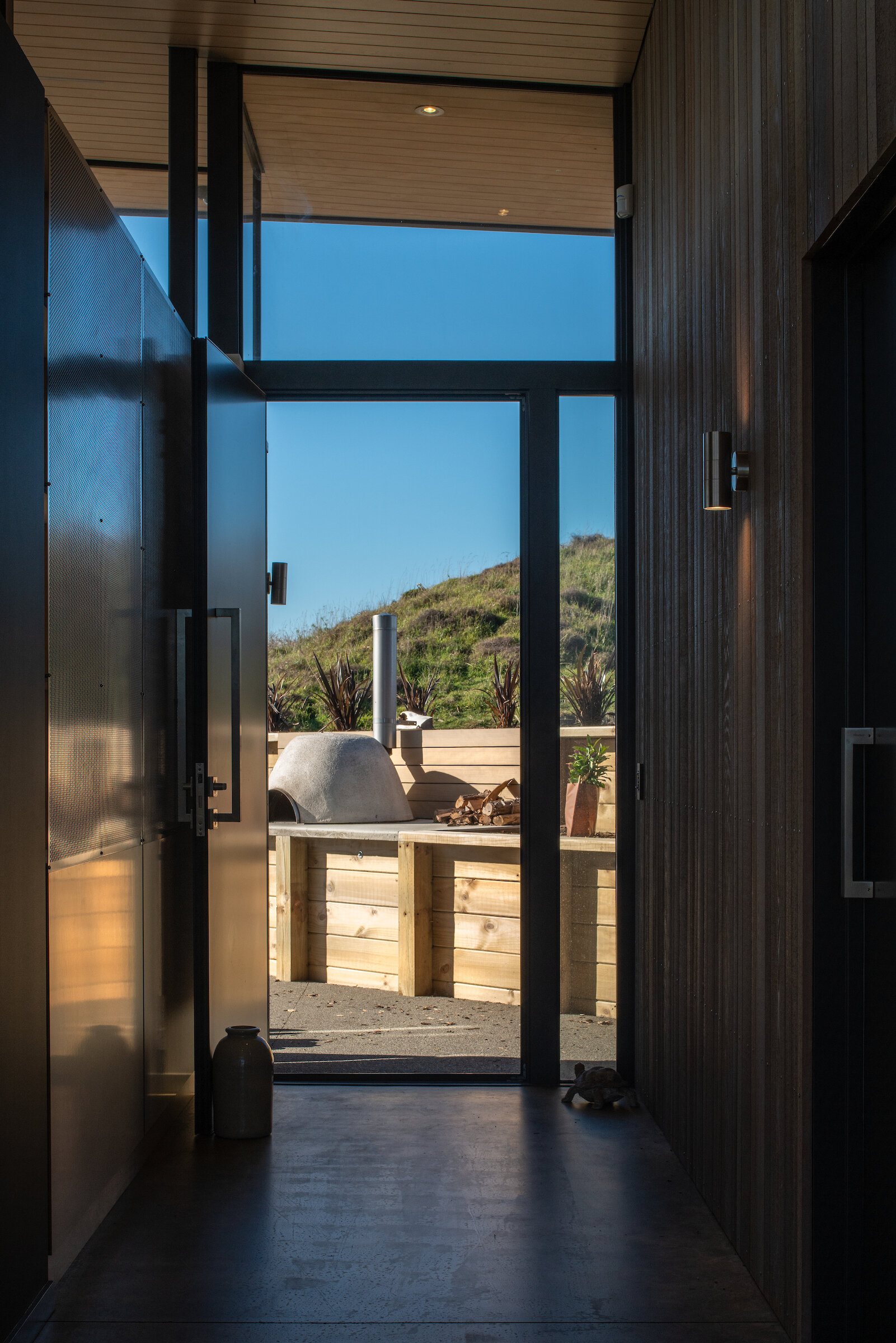 First Light Studio Te Horo Beach House interior with timber-lined walls and natural materials