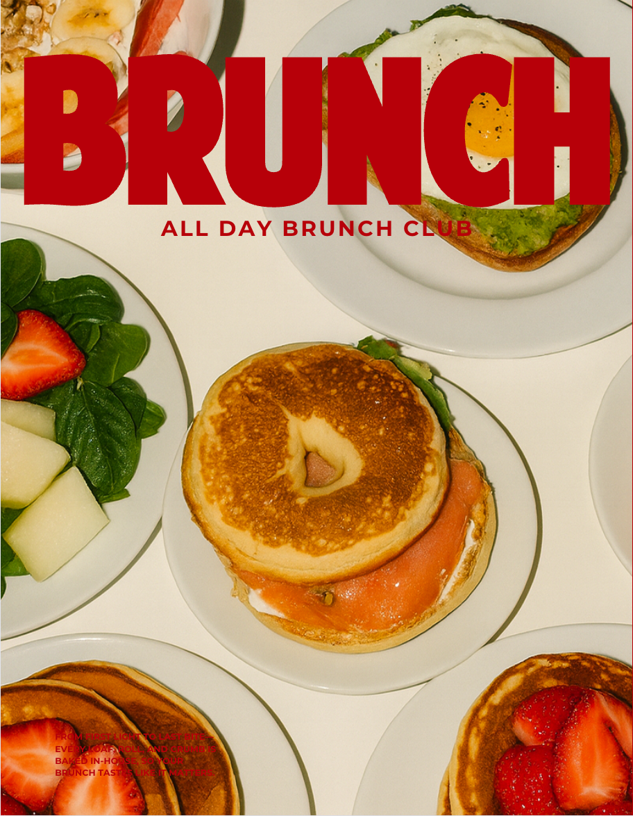 Plates with breakfast items including a plate with an avocado toast topped with a fried egg, a waffle with strawberries, and a fresh fruit salad with strawberries, melons, and spinach.