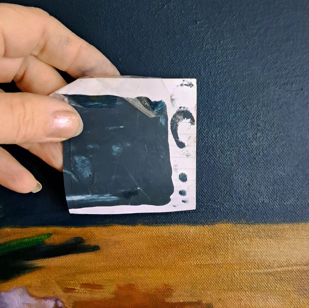 Paint swatch against the canvas