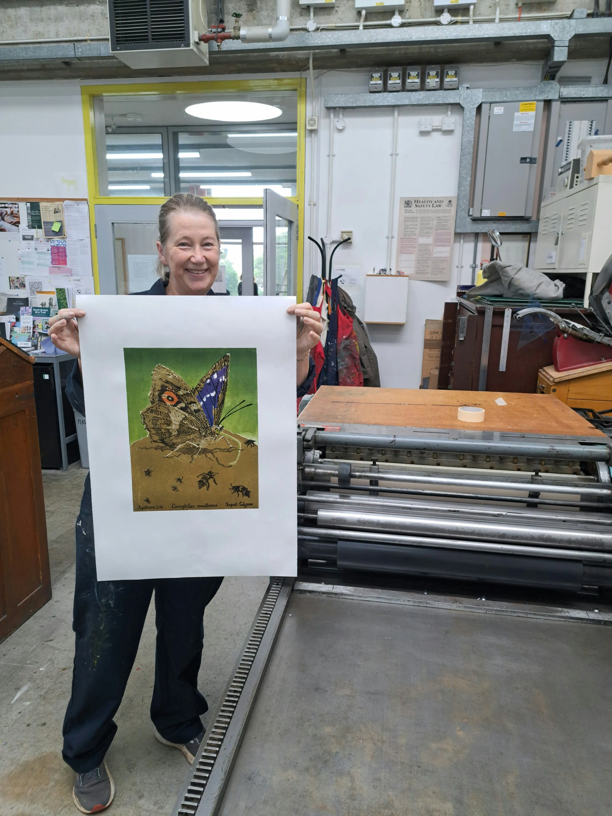 Early proof linocut with Vandercook press (1).jpg