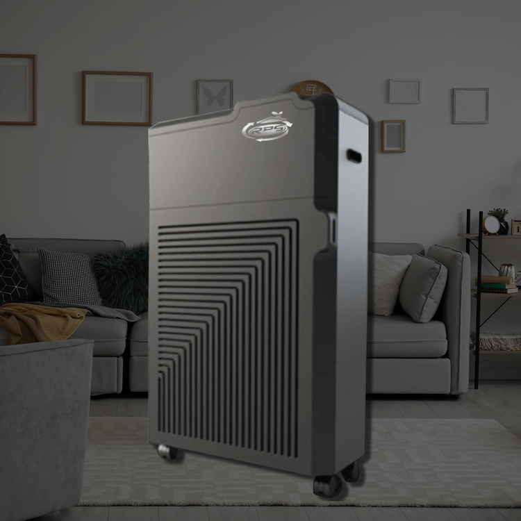 RPS 600S portable air purifier standing in a living room beside a gray sofa