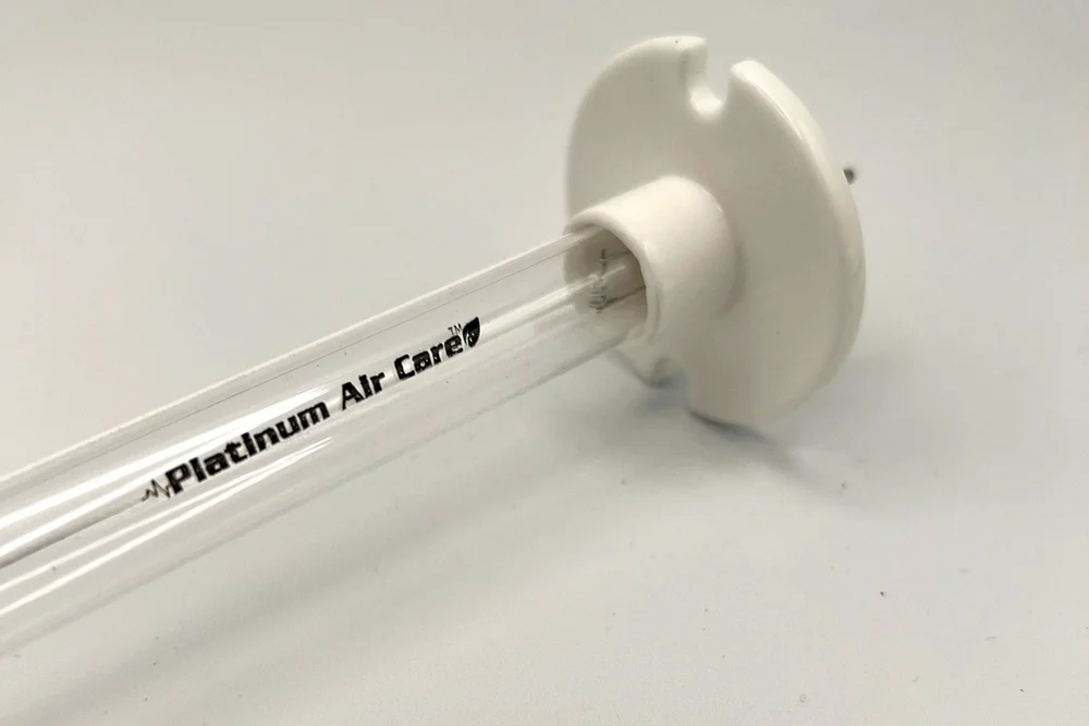 Platinum Air Care replacement UV-C lamp with its white base