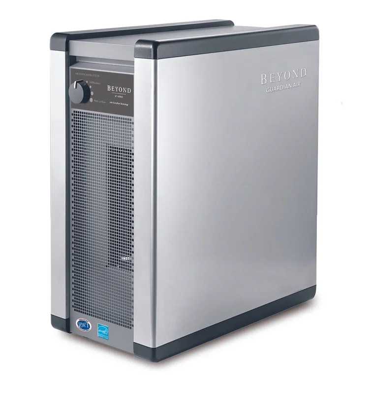 Aerus Beyond Guardian Air, a silver portable active air purifier with a control knob