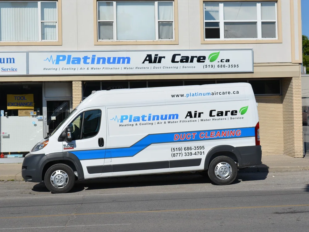 Platinum Air Care duct cleaning van parked outside the Platinum Air Care shop in London, Ontario