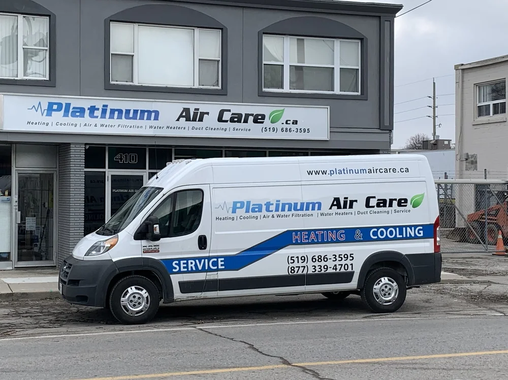 The Platinum Air Care office at 410 Third Street in London, Ontario, with a Platinum Air Care heating and cooling van out front
