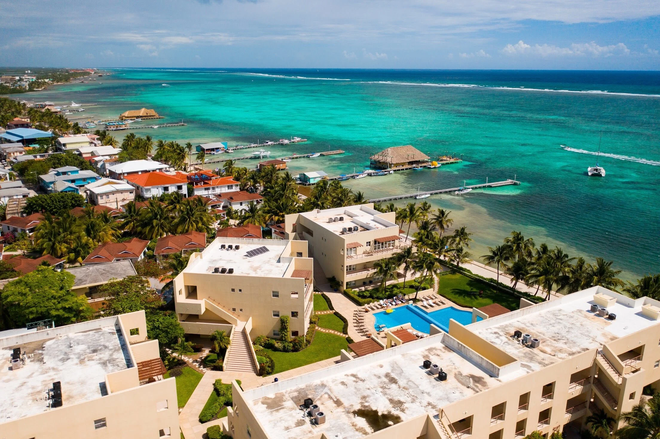 Two heated saline pools surrounded by tropical gardens at our central San Pedro town location.