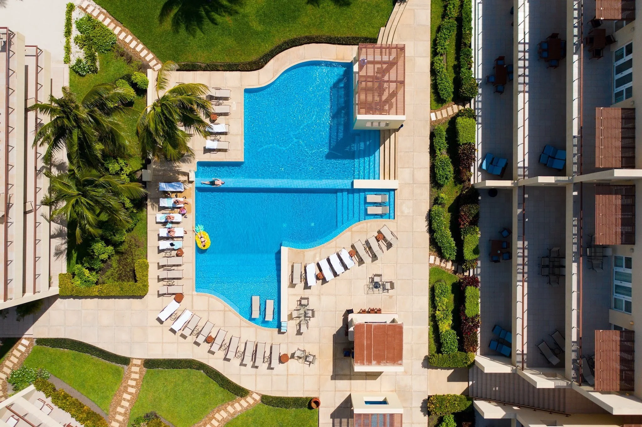 Heated saline infinity pool at The Phoenix Resort overlooking San Pedro beachfront.