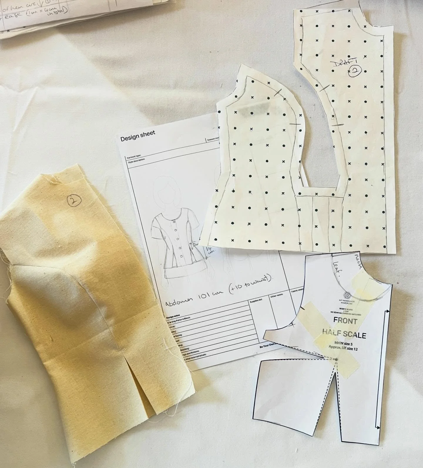 Deborah used our bodice block and fitting guide to create her own block at our MHW pattern Making retreat. After achieving a perfect fit, she spent the final day learning how to make her darts into princess seams, add pleats and develop her first pat