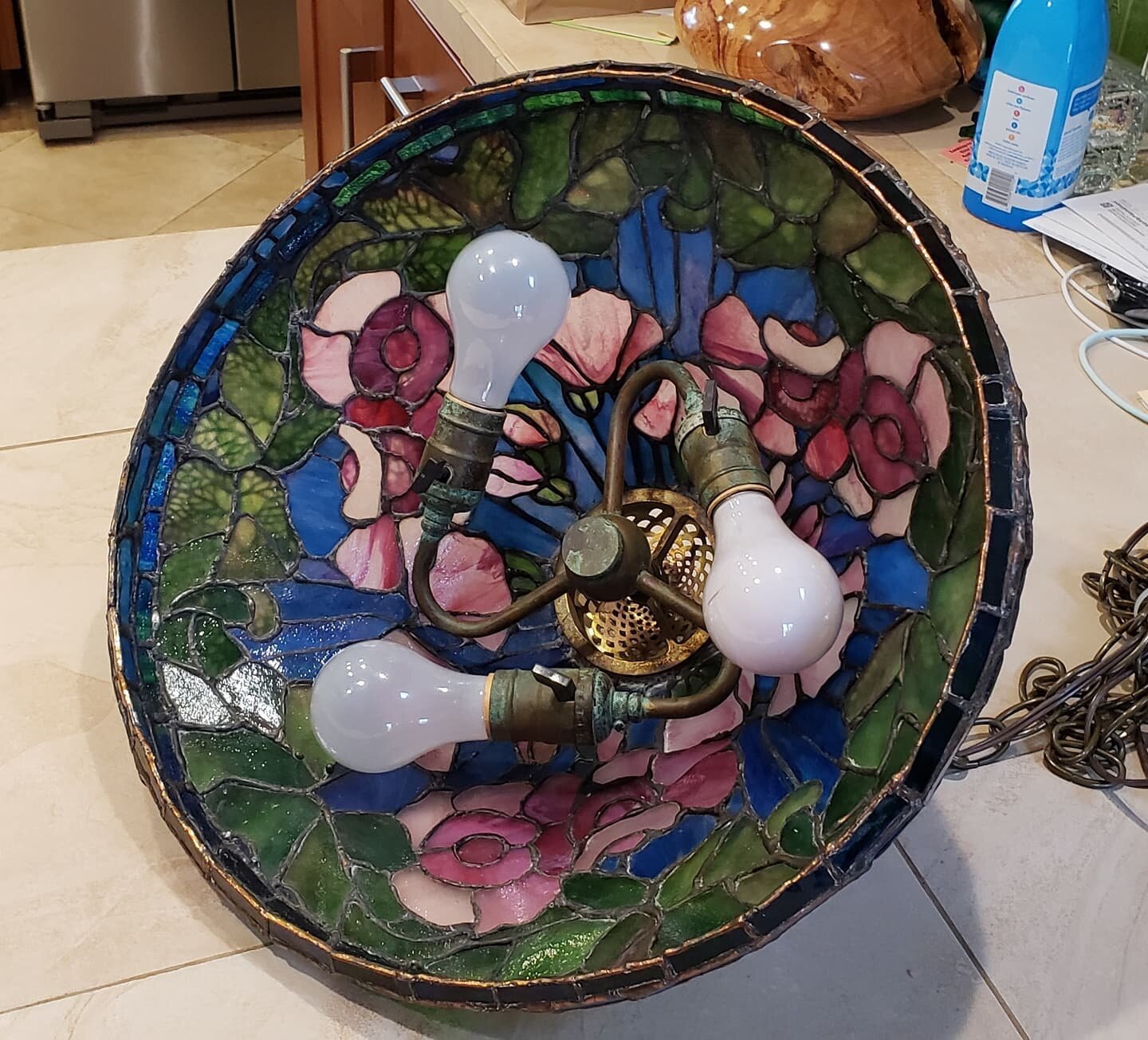 $150. Tiffany style Hanging Lamp Stained Glass Pendant Light Fixtures Kitchen Island Lighting 17 inch diameter Lampshade Width Deco for Dining Room. Has a long chain and wall plug for easy use. Works great. Has 3 Fixtures for plenty of light. 
Plus t