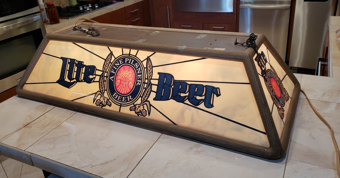 $160. Vintage 1980's MILLER LITE LOGO POOL TABLE BAR LIGHT HANGING SIGN light fixture collectable mancave garage man cave. Works great, ready to hang. 
Plus tax.
This item is located in my Antique Mall booth in the city or Orange. Text Message (don't