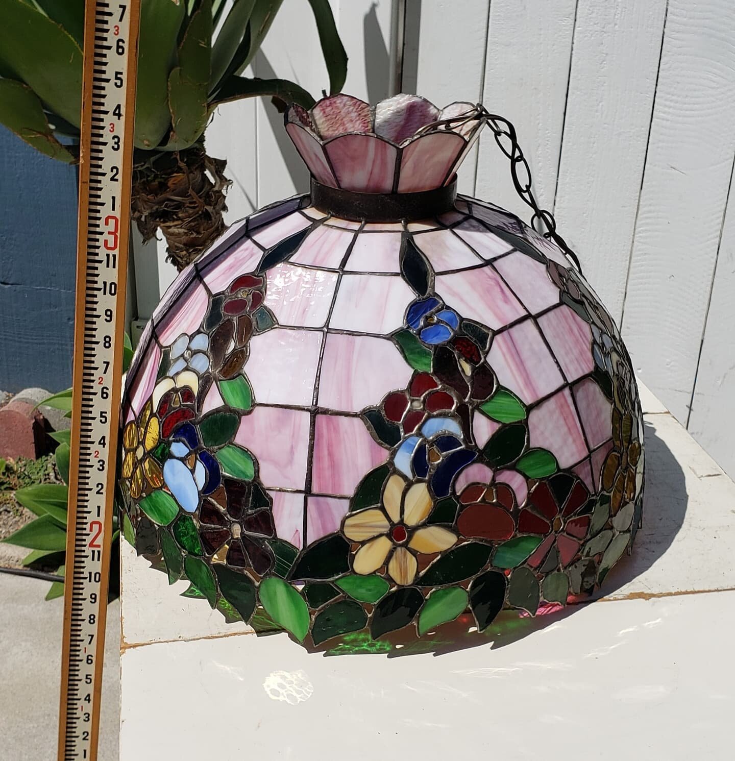 $200. Stained glass tiffany style large hanging lamp light fixture. Great for kitchen, dining room, entryway or whatever. Needs hardwired to house or a plug added. 14&quot; tall 21&quot; diameter. This is much larger than the average light you see, f