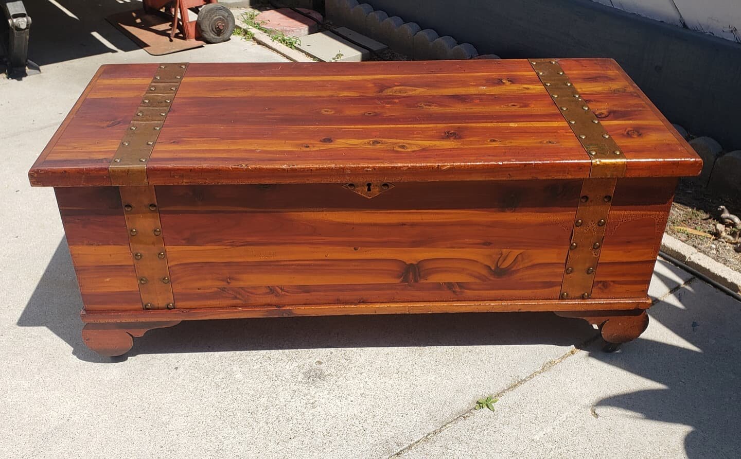 $75. Antique wood cedar chest box cabinet with metal straps and wood casters / wheels. Works great 41&quot; long 17&quot; tall 17&quot; deep. 
Plus tax.
This item is located in my Antique Mall booth in the city or Orange. Text Message (don't call) fo