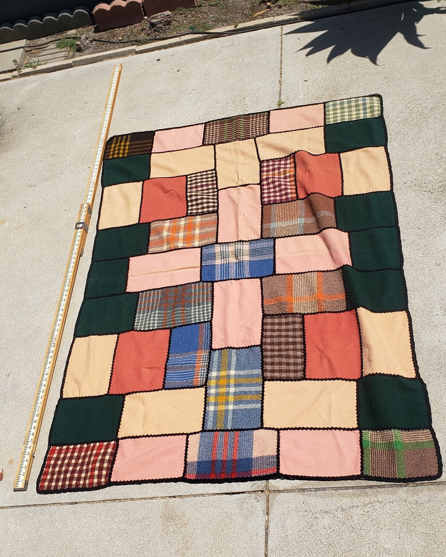 $45. 1950s quilt blanket embroidered hand quilted textile.  6 feet long. Original owner told me her mom made it for her in the late 1950s. 
Plus tax.
This item is located in my Antique Mall booth in the city or Orange. Text Message (don't call) for a