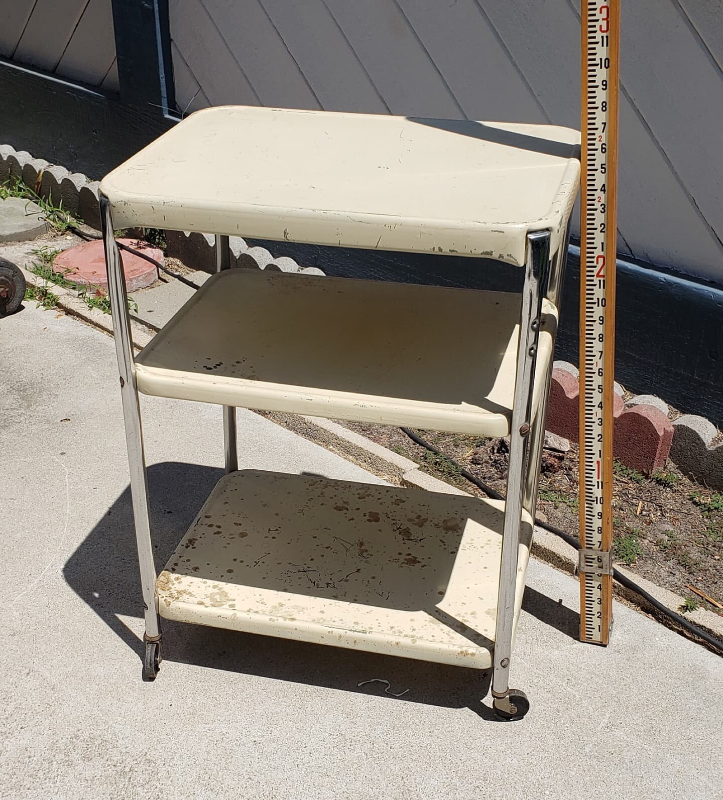 $45. Vintage metal bar TV Television stand with wheels. Works great. 3 shelf unit. 30&quot; tall 22&quot; wide 16&quot; deep. Work bench garden cart
Plus tax.
This item is located in my Antique Mall booth in the city or Orange. Text Message (don't ca