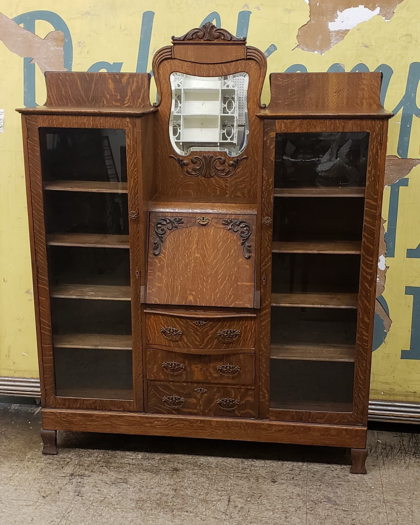 $275. Antique secretary desk mirrored vanity China cabinet hutch with beveled glass doors. Quarter sawn tiger oak. Works great. 72&quot; tall 56.5&quot; wide 14&quot; deep. 
Plus tax.
This item is located in my Antique Mall booth in the city or Orang