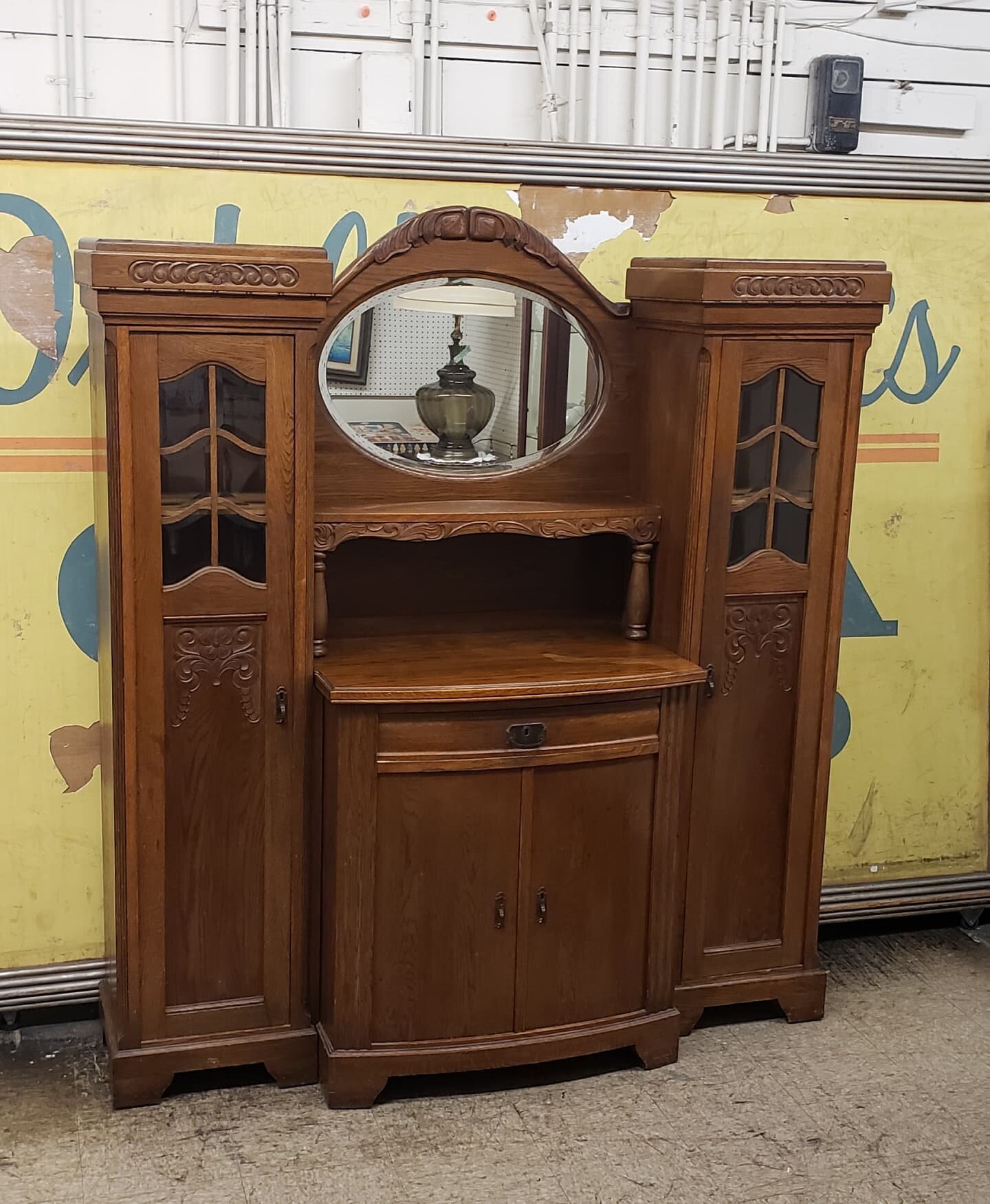 $300. Antique sideboard buffet China cabinet vanity hutch entryway piece. Comes apart in 3 pieces for easy transport ( just need a flathead screwdriver). 75&quot; tall 68&quot; wide 21&quot; deep. 
Plus tax.
This item is located in my Antique Mall bo