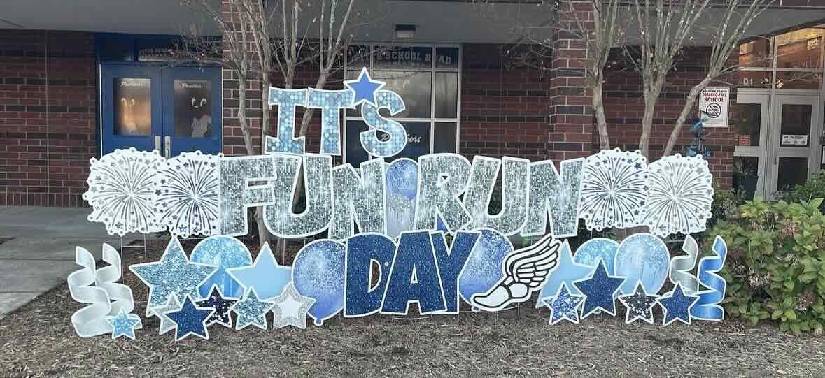 Custom Yard Card sign that reads "It's Fun Run Day" in blue and silver sparkle letters
