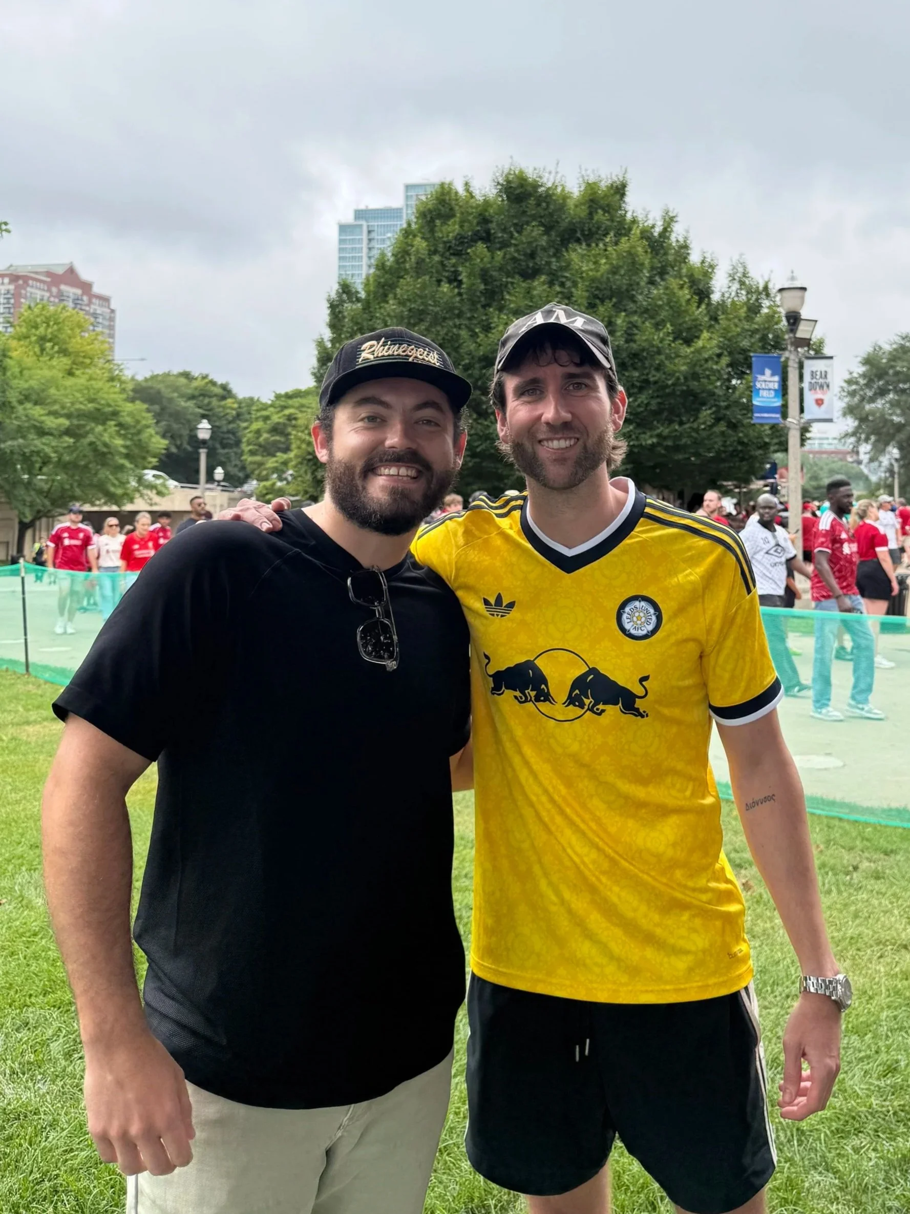 Ryan Shephard standing with Matthew Lewis, the actor who played Neville Longbottom in the Harry Potter series. Picture was taken at Soldier Field for an event put on by Liverpool FC and Leeds United. 