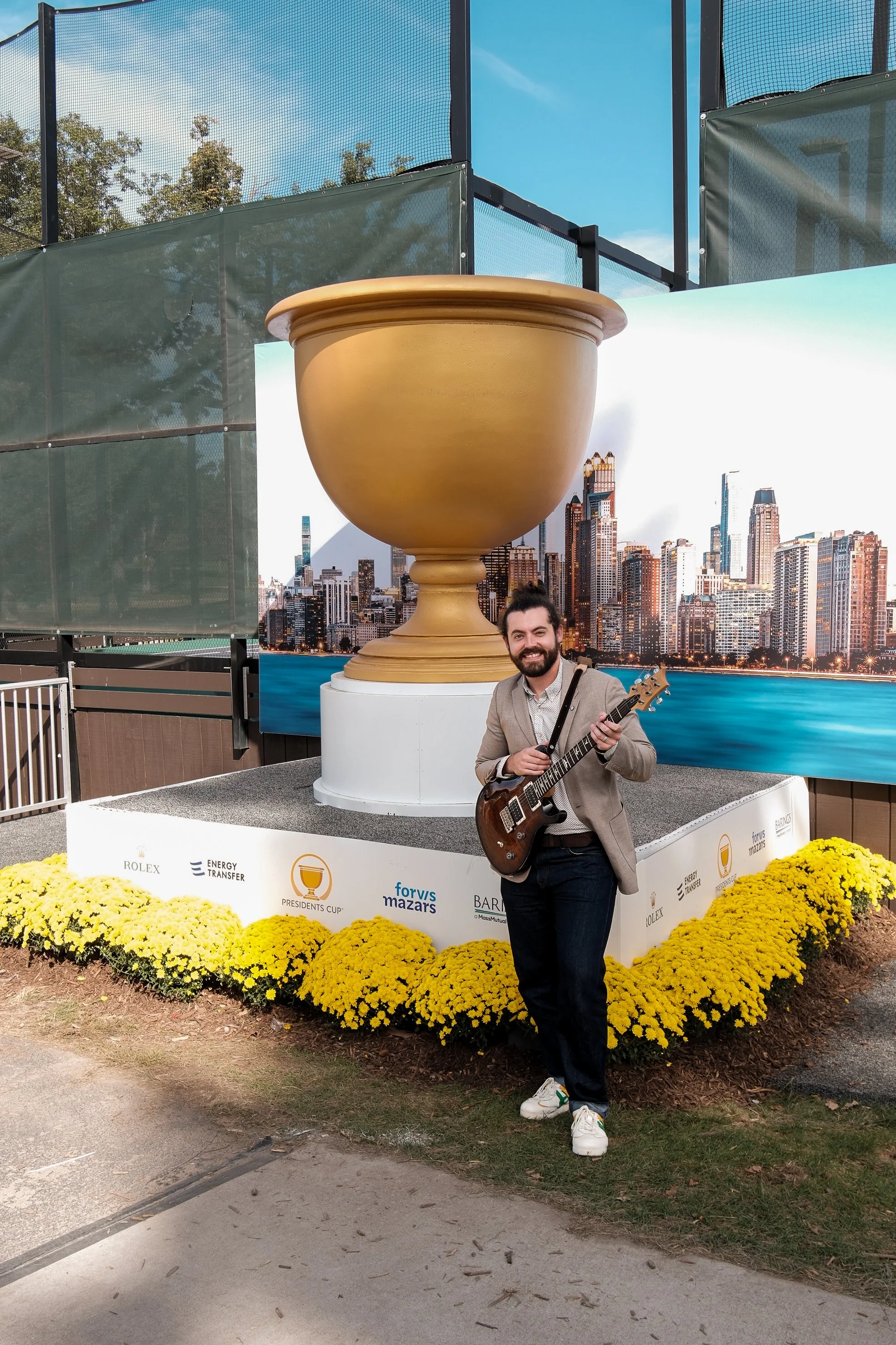 Ryan Shephard performing live at the 2026 President's Cup at Medinah Country Club. Notable attendees included the President of the United States Donald Trump, Derrick Rose, Connor Bedard, and Scottie Scheffler.  