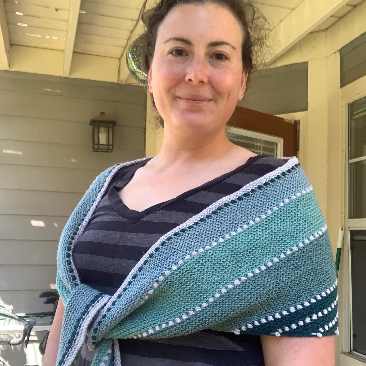 Finished and blocked January Skies Shawl by @mairlynd using @quinceandco Chickadee in Peacock, Aleutian, Belize, Bird&rsquo;s Egg, and Frost. This was a super fun shawl to make, used my favorite colors, and I love the yarn! It&rsquo;s great for year 