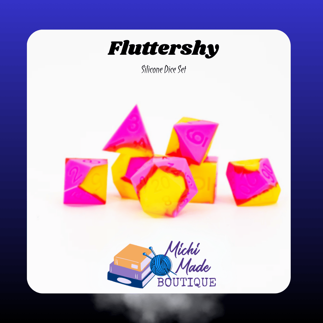 Fluttershy — Hot pink and bright yellow silicone RPG dice, seven polyhedrals on a white background.