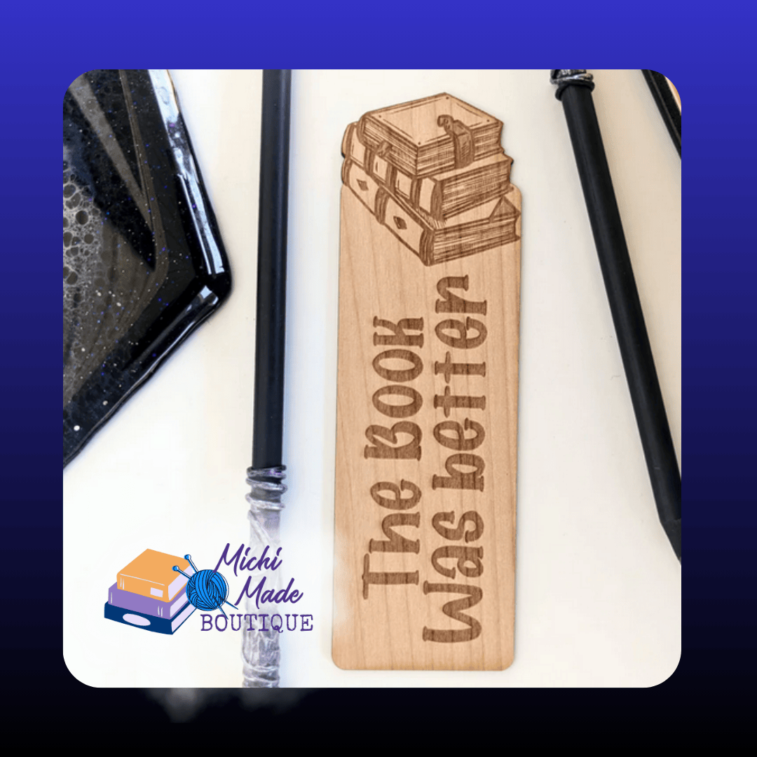 The Book Was Better – Alder bookmark engraved with a stack of books and the phrase “The Book Was Better.”