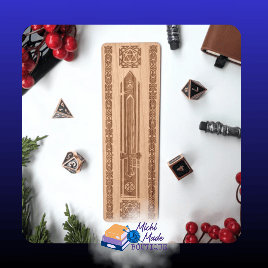 Celtic Dice Sword: “Alder wood bookmark engraved with a Celtic-knot border, sword motif, and d20 symbols, styled with dice and journal props.”