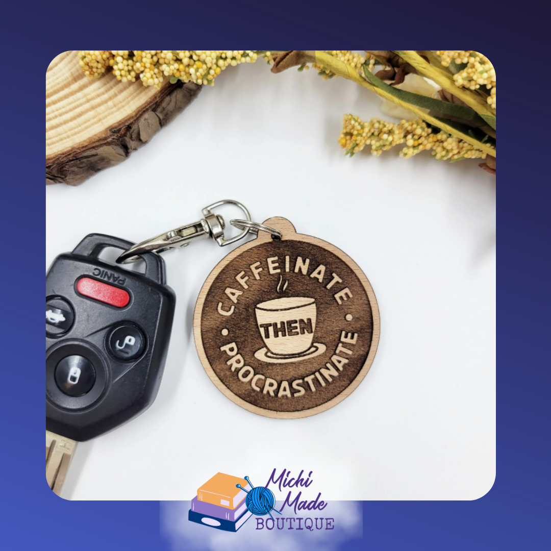 Round wood keychain with “Caffeinate Then Procrastinate” around a coffee cup.