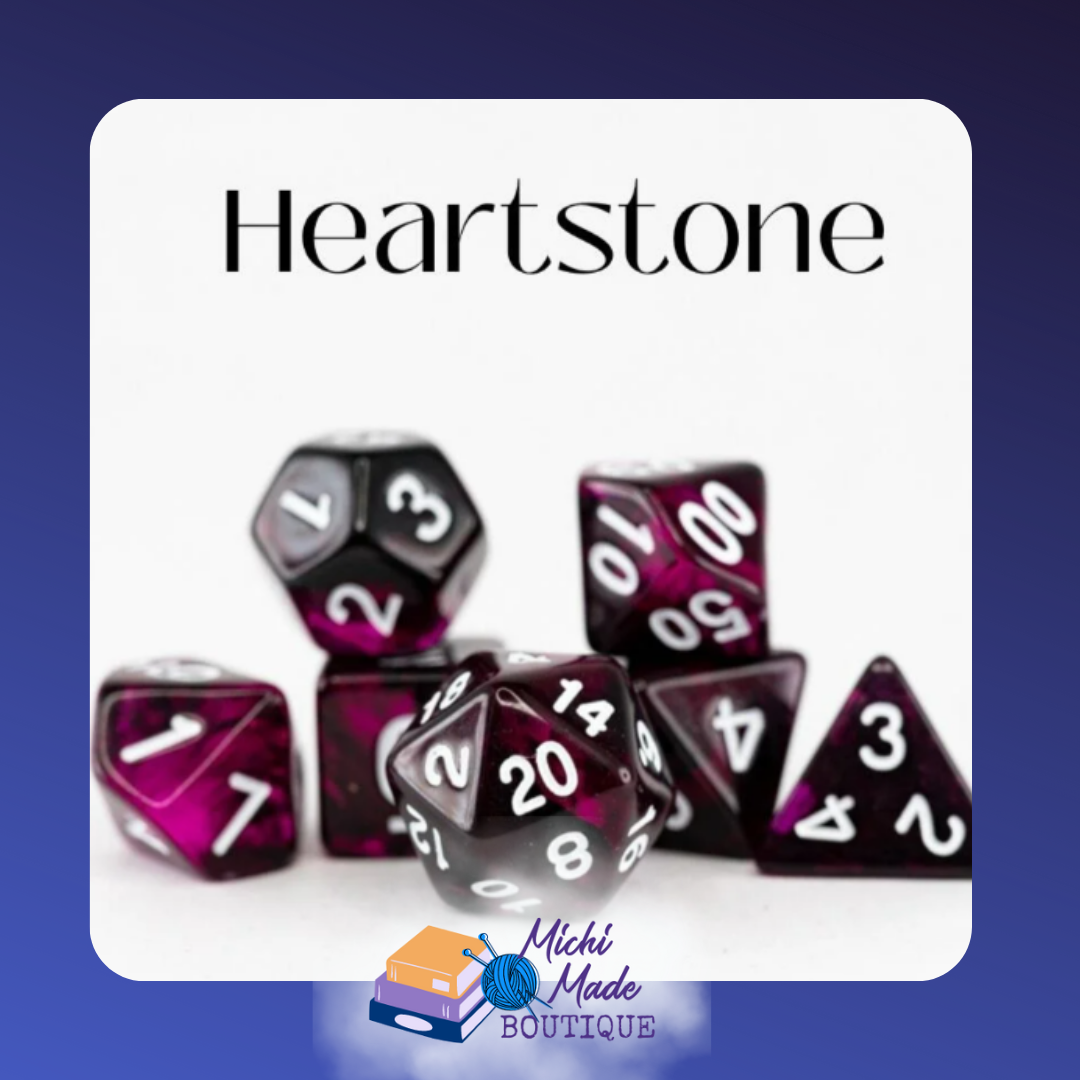 Heartstone: “Wine-purple and black acrylic dice with bold white numerals.”