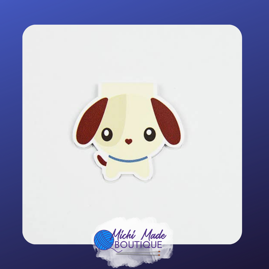 Cute cartoon dog bookmark with floppy brown ears, wide eyes, and a tiny heart-shaped nose.