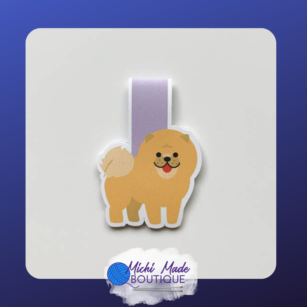 Chow Chow dog magnetic bookmark with a fluffy orange coat, curly tail, and happy face..