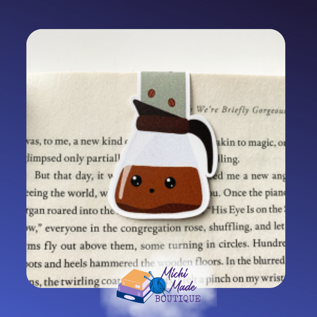 Magnetic bookmark shaped like a smiling coffee pot filled with dark brown coffee.