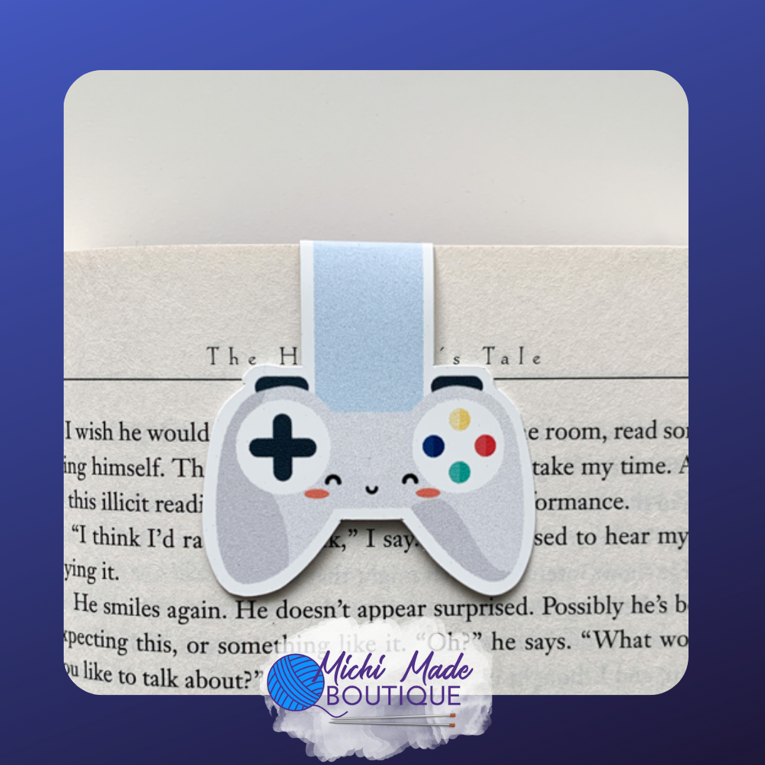 A smiling gray game controller with colorful buttons marks the gaming chapter in style.