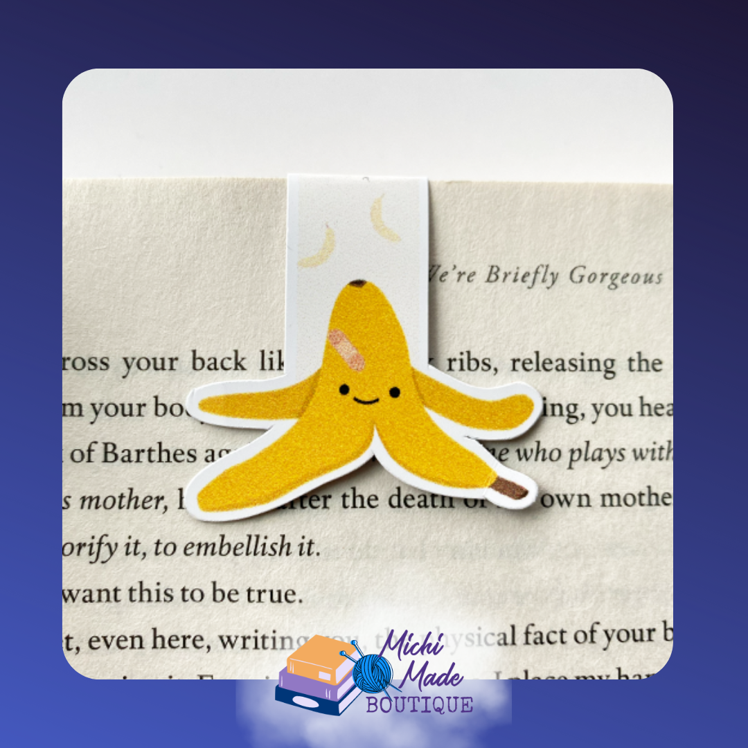 Yellow banana peel magnetic bookmark with a smiling face and a tiny bandage on its head.