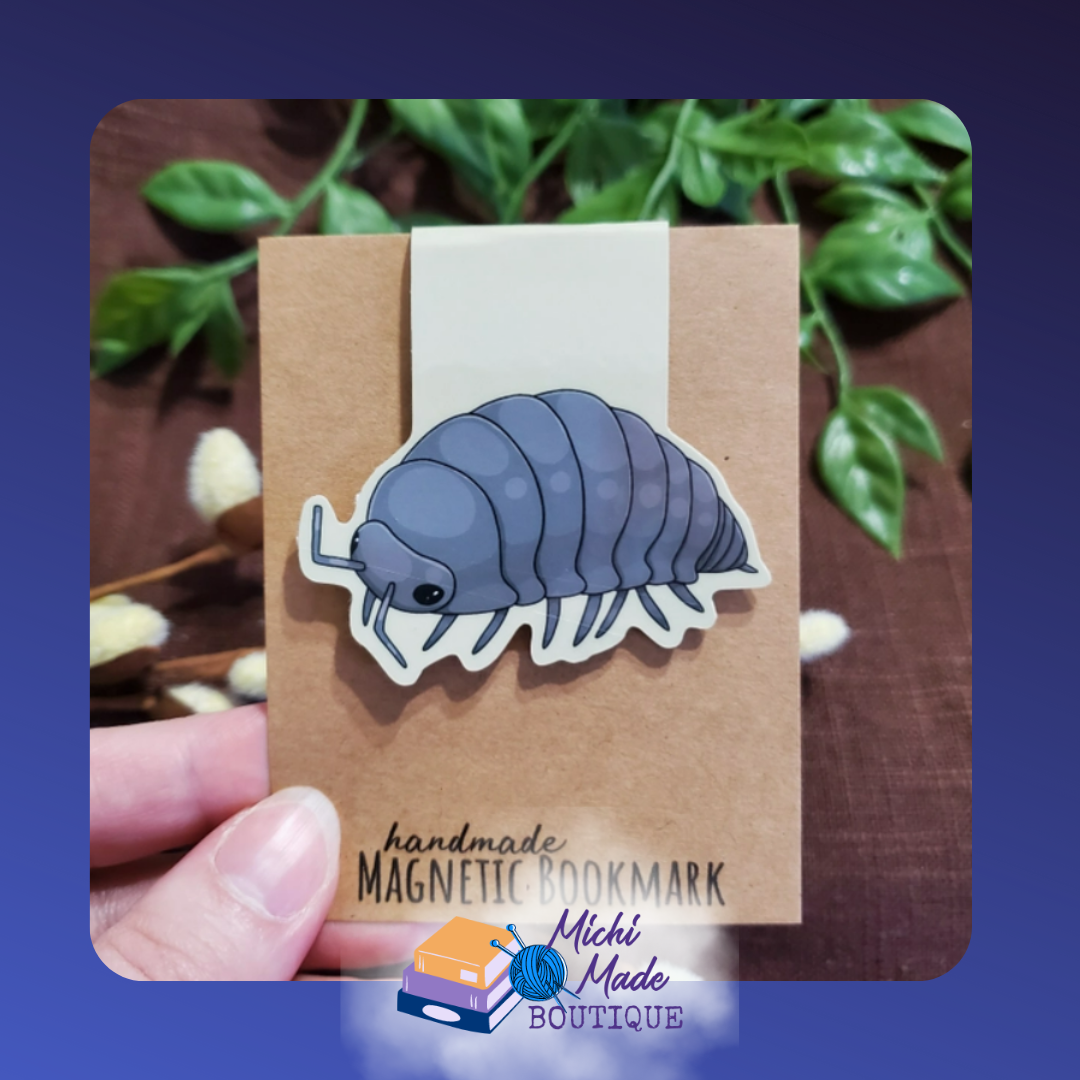 Grey pill bug magnetic bookmark in curled-up pose.