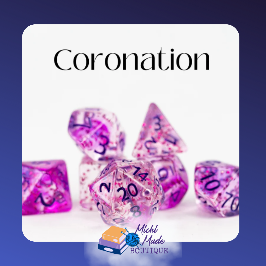 Coronation: “Clear pink-lavender acrylic dice with confetti glitter and navy numerals.”
