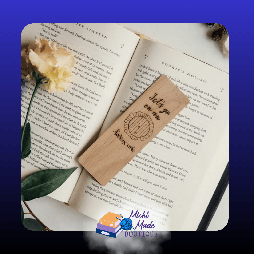 Let’s Go on an Adventure (Hobbit Hole) — “Alder wood bookmark etched with a round hobbit-hole door and the phrase ‘Let’s go on an adventure.’”