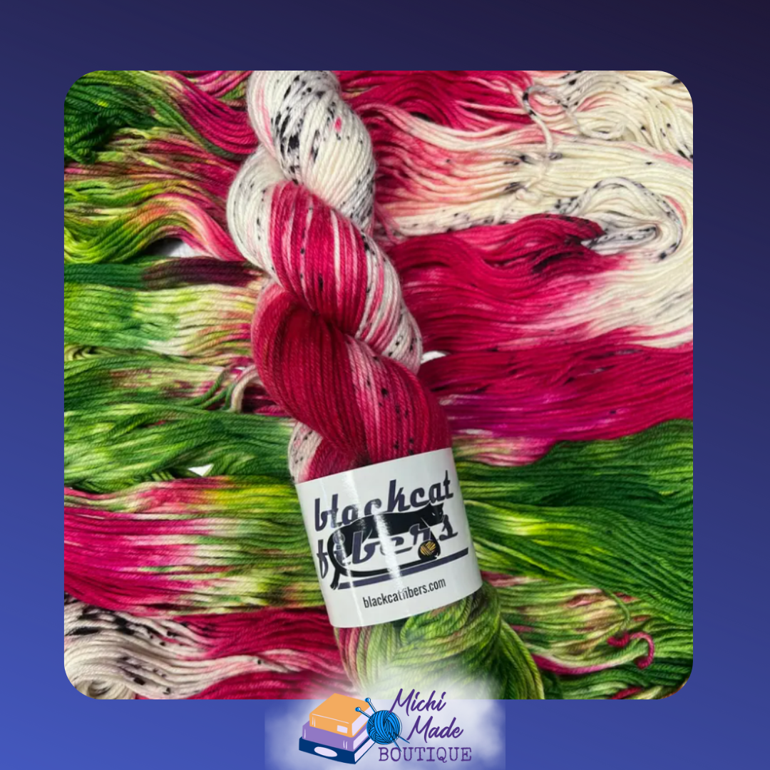 Dragon Fruit.png — Bright pink, green, and white speckled yarn skein, fruit-inspired colors.