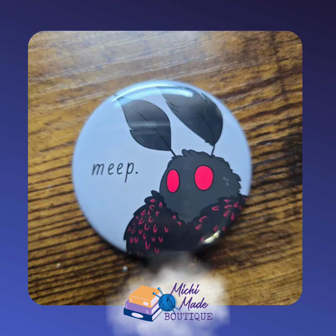 Mothman Meep Fridge Magnet – Cute Mothman with red eyes next to “meep.” text.