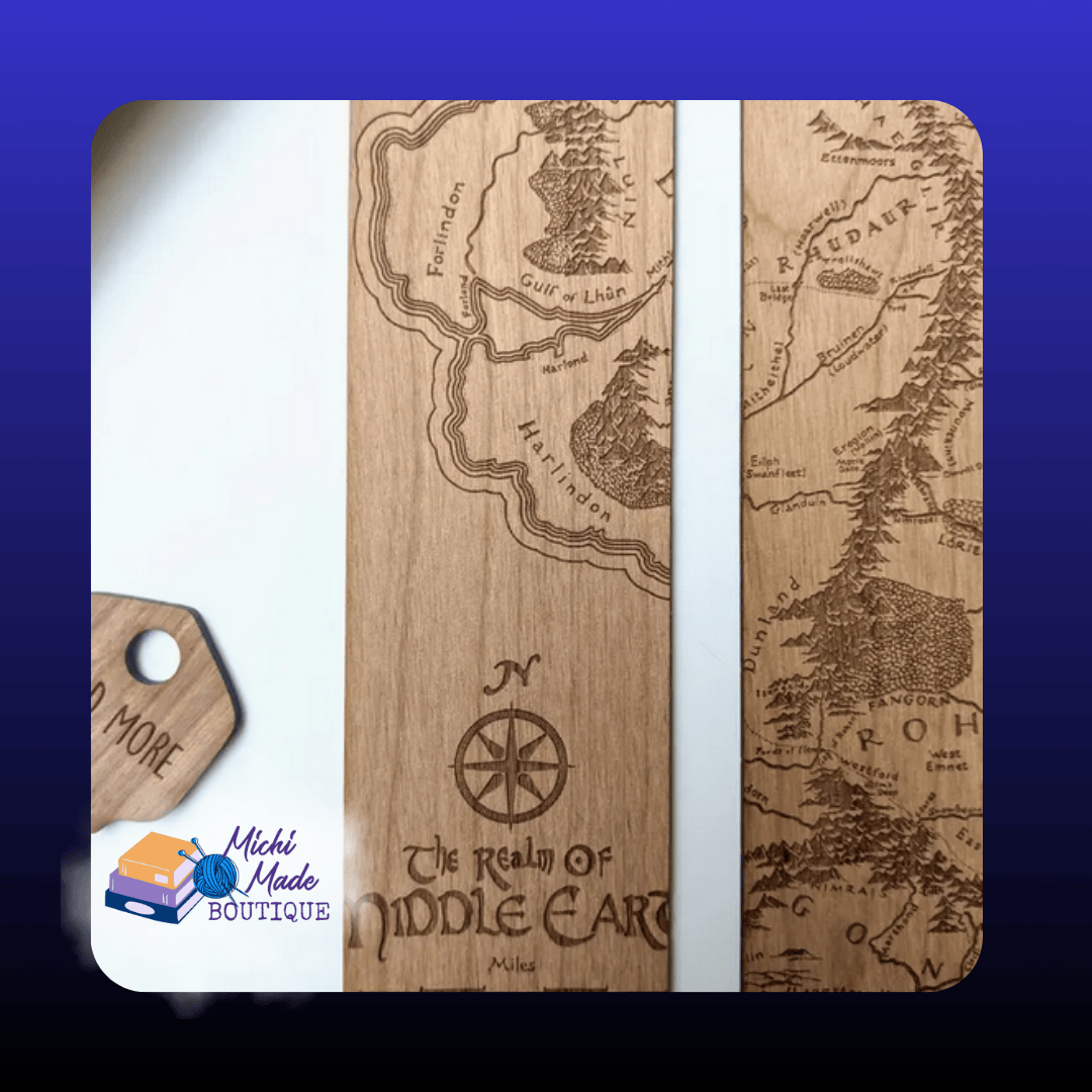 Middle Earth Map — “Alder bookmark engraved with a tall cartographic slice labeled ‘The Realm of Middle-earth’ and compass rose.”