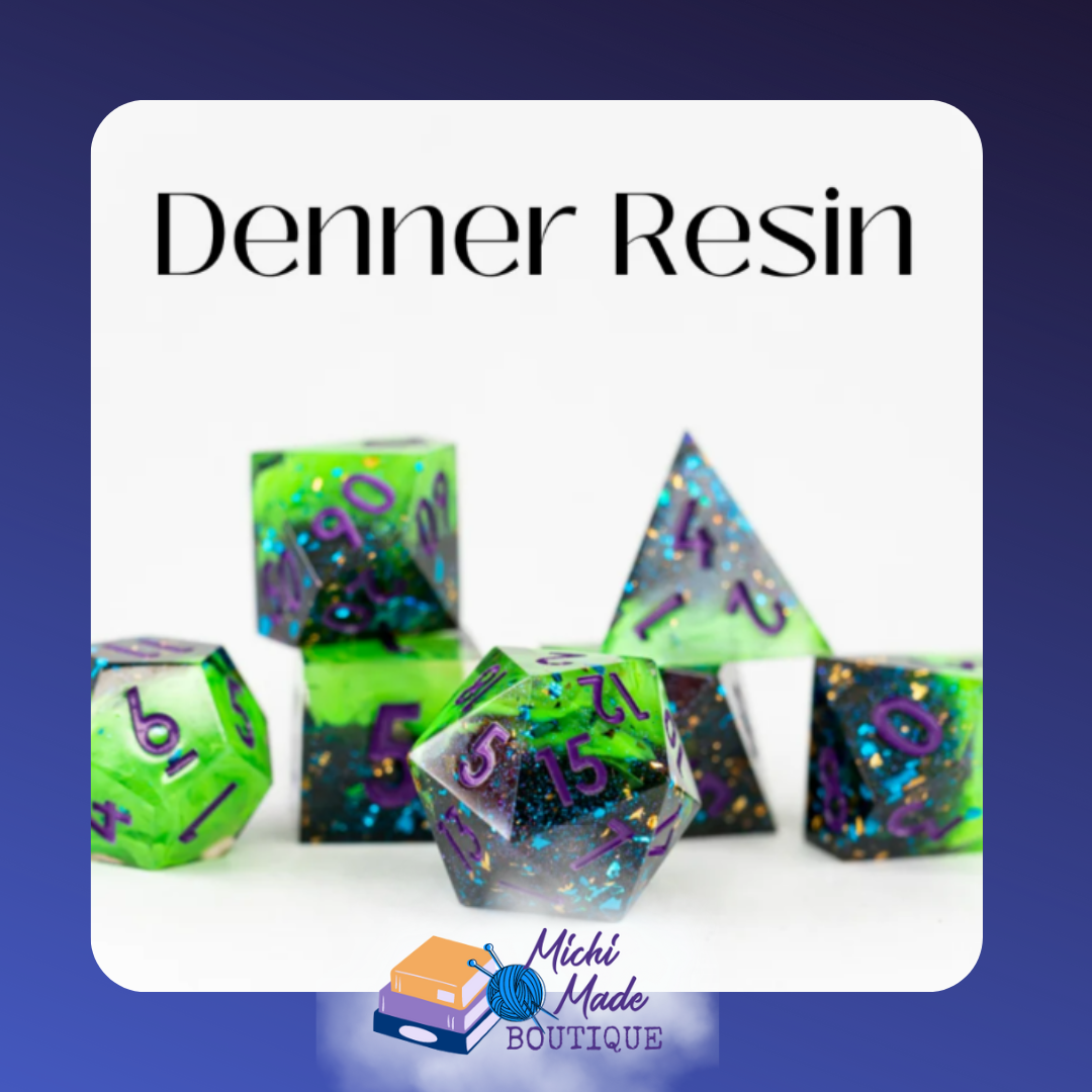 Denner Resin — Green and black resin dice with blue glitter and gold flakes, purple numbering on a white background.
