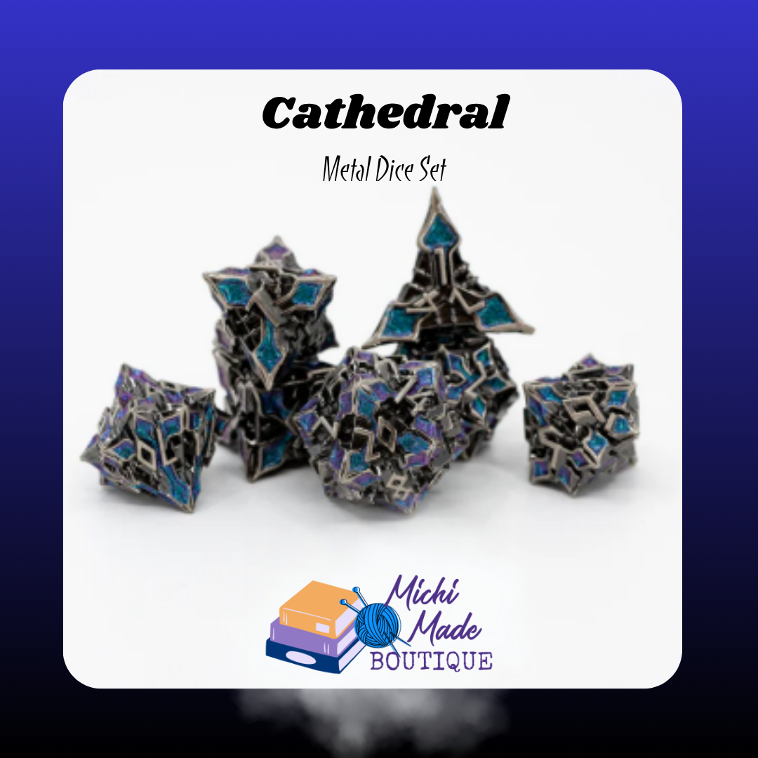 Cathedral Set Image  “Seven-piece silver and blue metal dice set with intricate stained-glass style geometric detailing, arranged in a small cluster on a white background.”