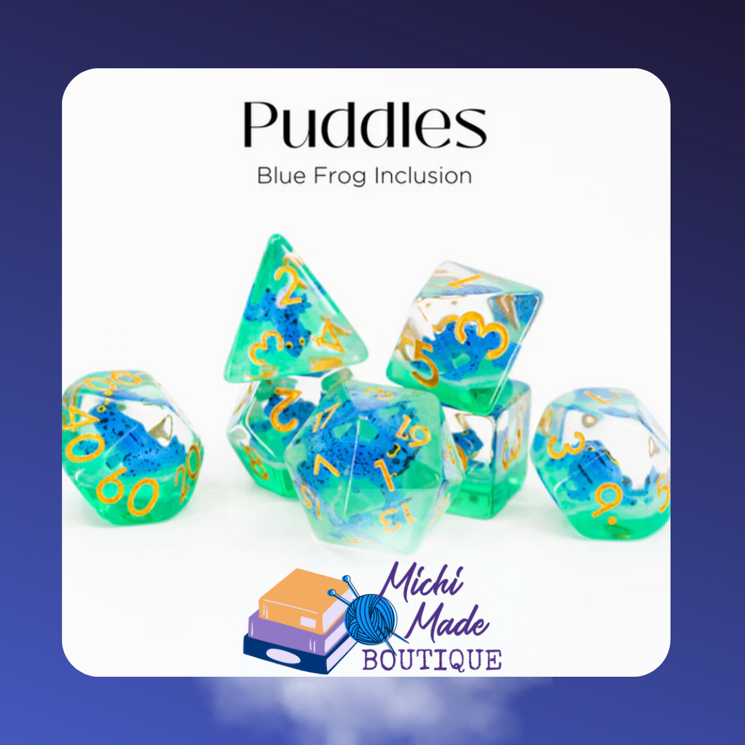 Green dice with blue frog inclusions, yellow numbers – Puddles set.