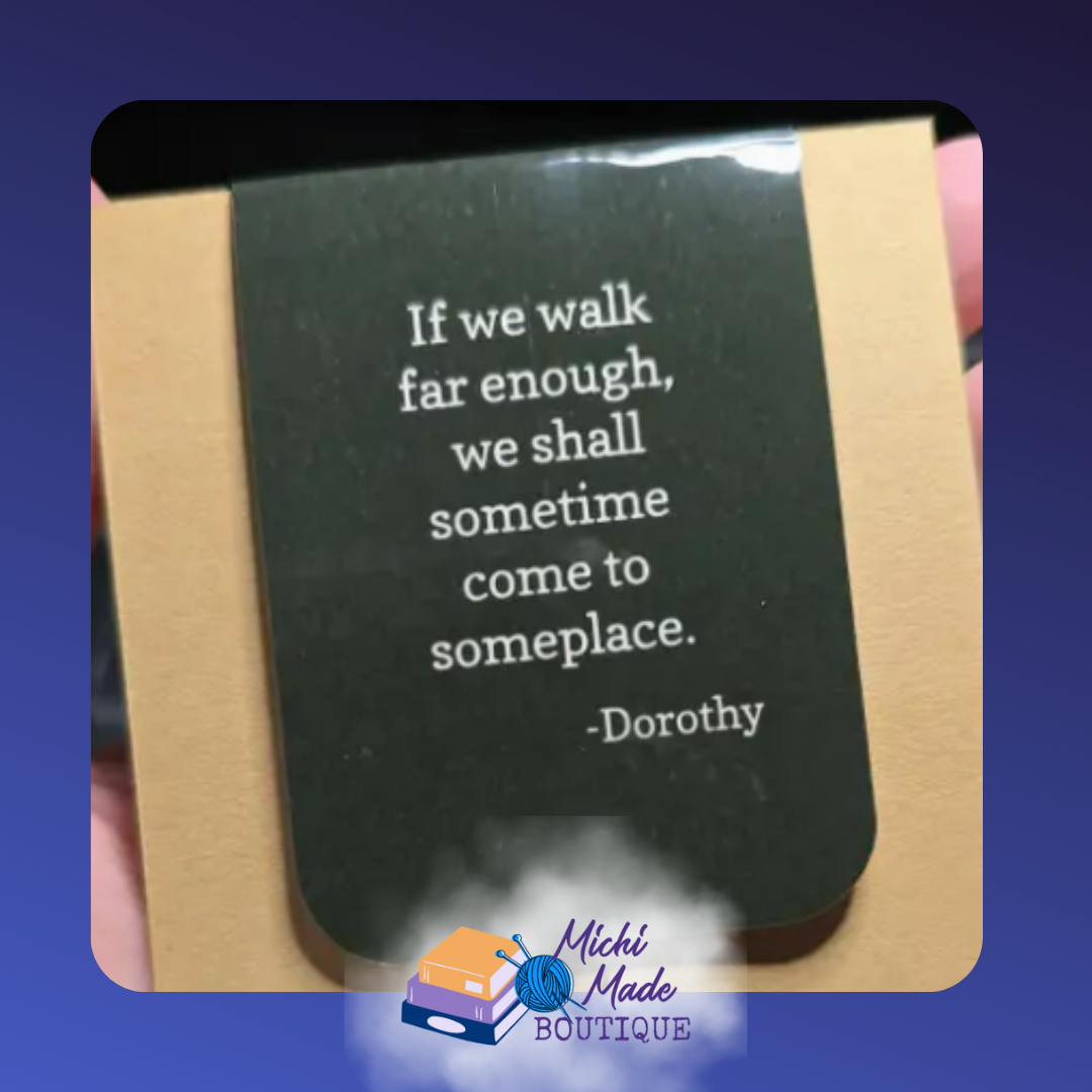 Quote by Dorothy: "If we walk far enough, we shall sometime come to some place." Dark Green background. Back of Emerald City Wizard Bookmark.