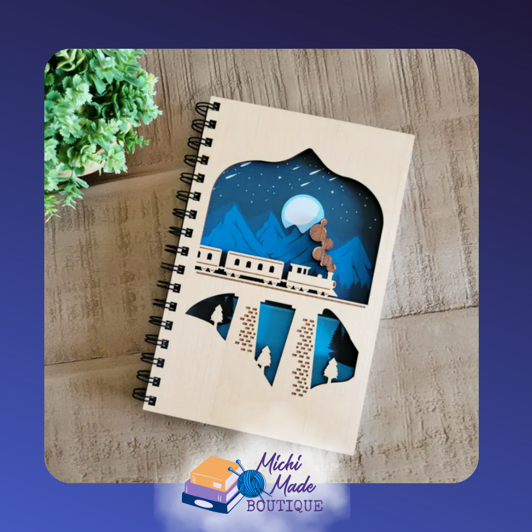Train Ride – Wood journal with layered cutout design of a train crossing a bridge under a moonlit sky.