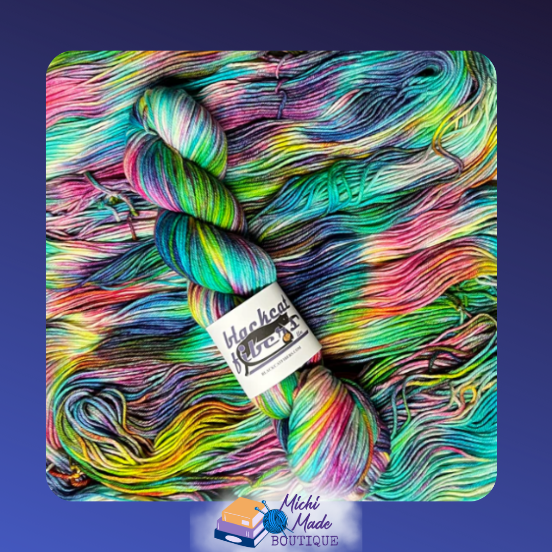 Unicorns vs. Narwhals 1.png — Rainbow pastel yarn skein with bold ocean blues.