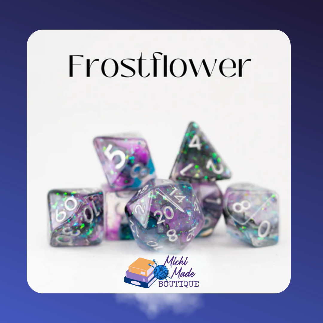 Frostflower: “Clear acrylic dice with purple-blue swirls and green sparkle; white numerals.”